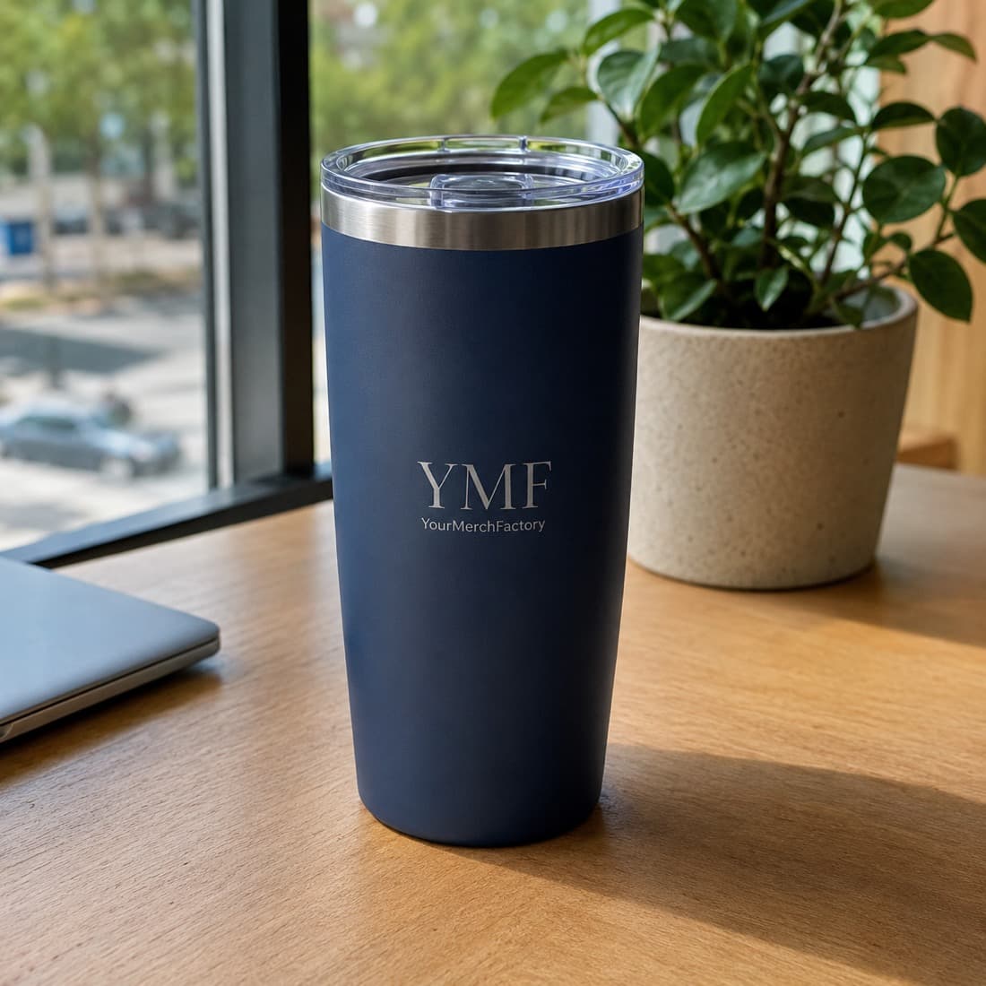 Stainless steel tumblers branded with a company logo